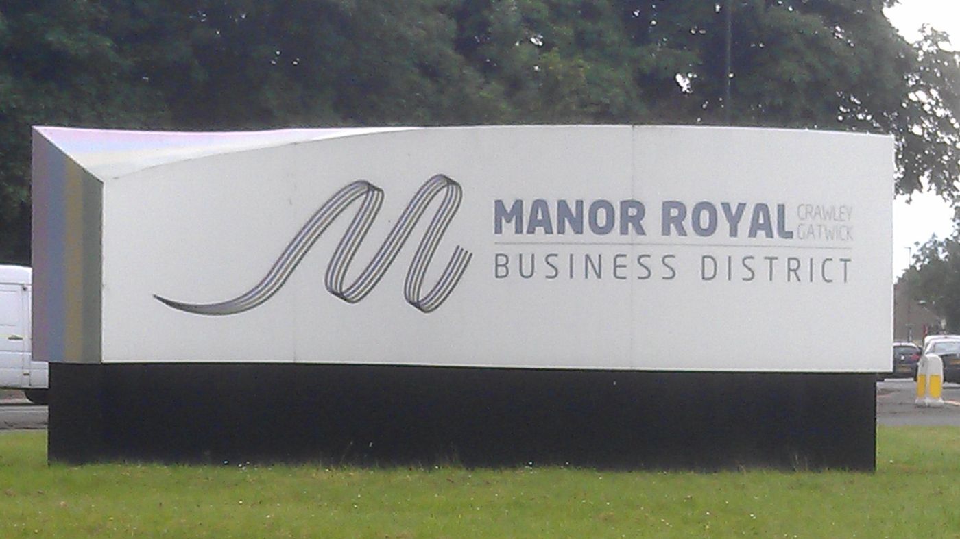 The Manor Royal Business District sign in Crawley